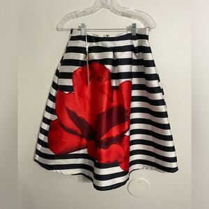 New with tags Icy Fashions Stripe and floral skirt Size Medium with pockets